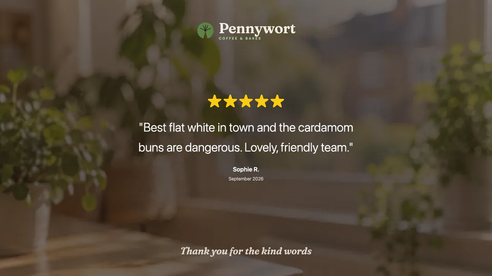 A five-star Google review on a cafe screen